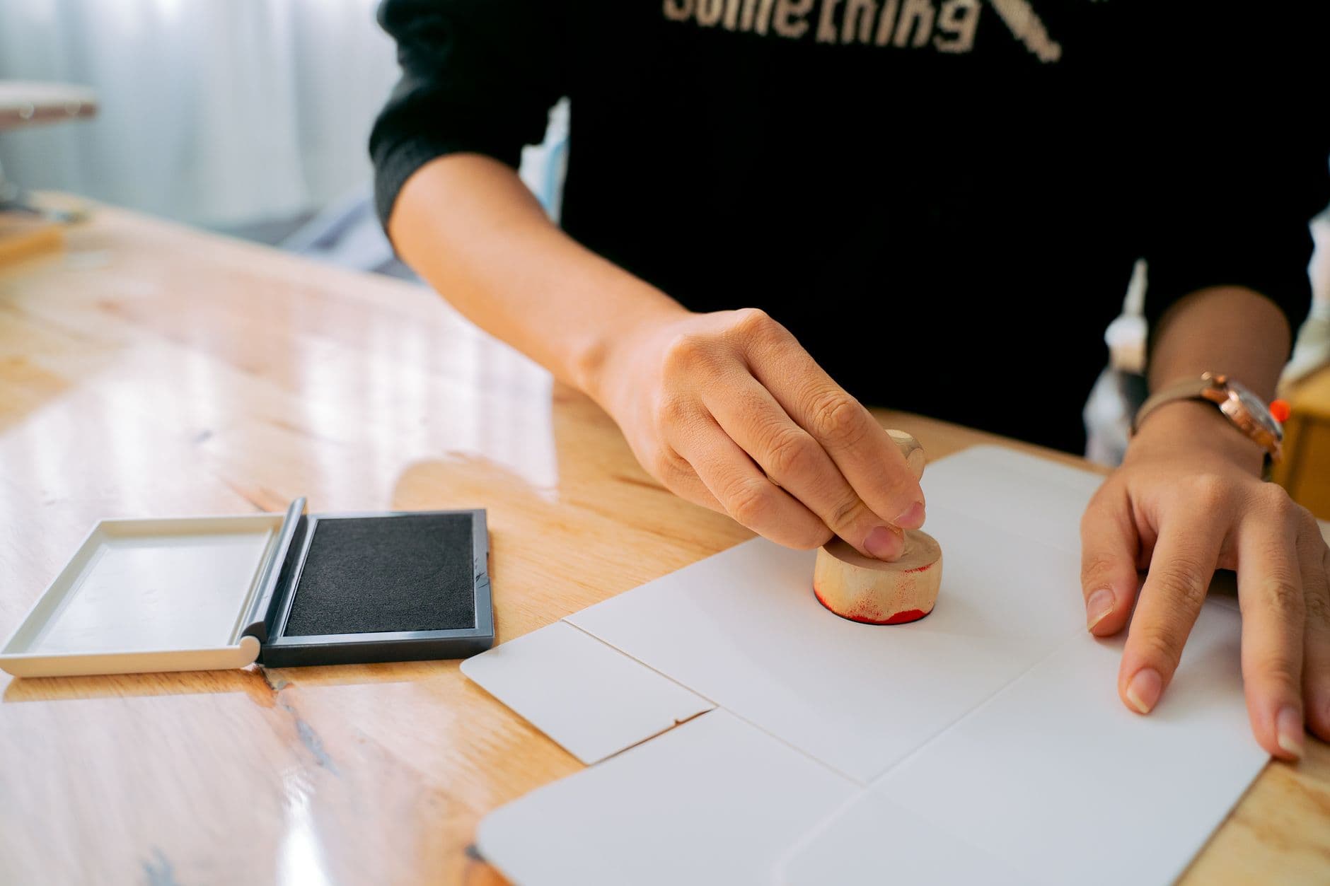 Notary stamping an official document